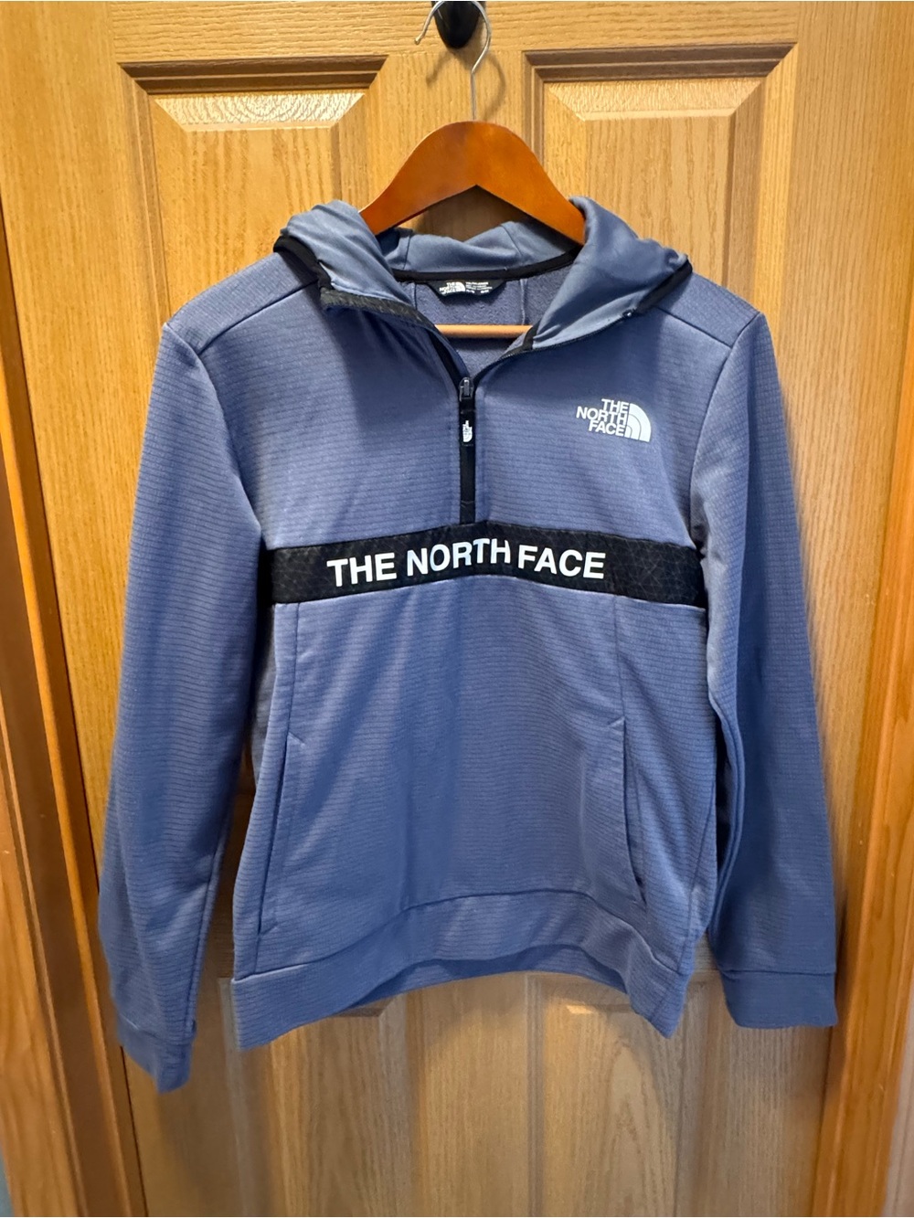The North Face Youth Slate Blue Quarter Zip-Up Hoodie with Black Chest Band